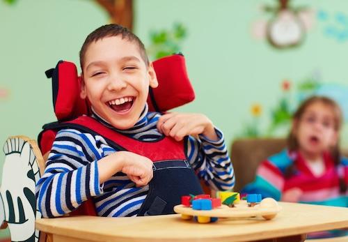A child with special needs playing at the dentist