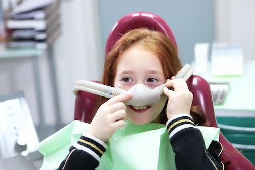 A child receiving oral conscious sedation in Weatherford.